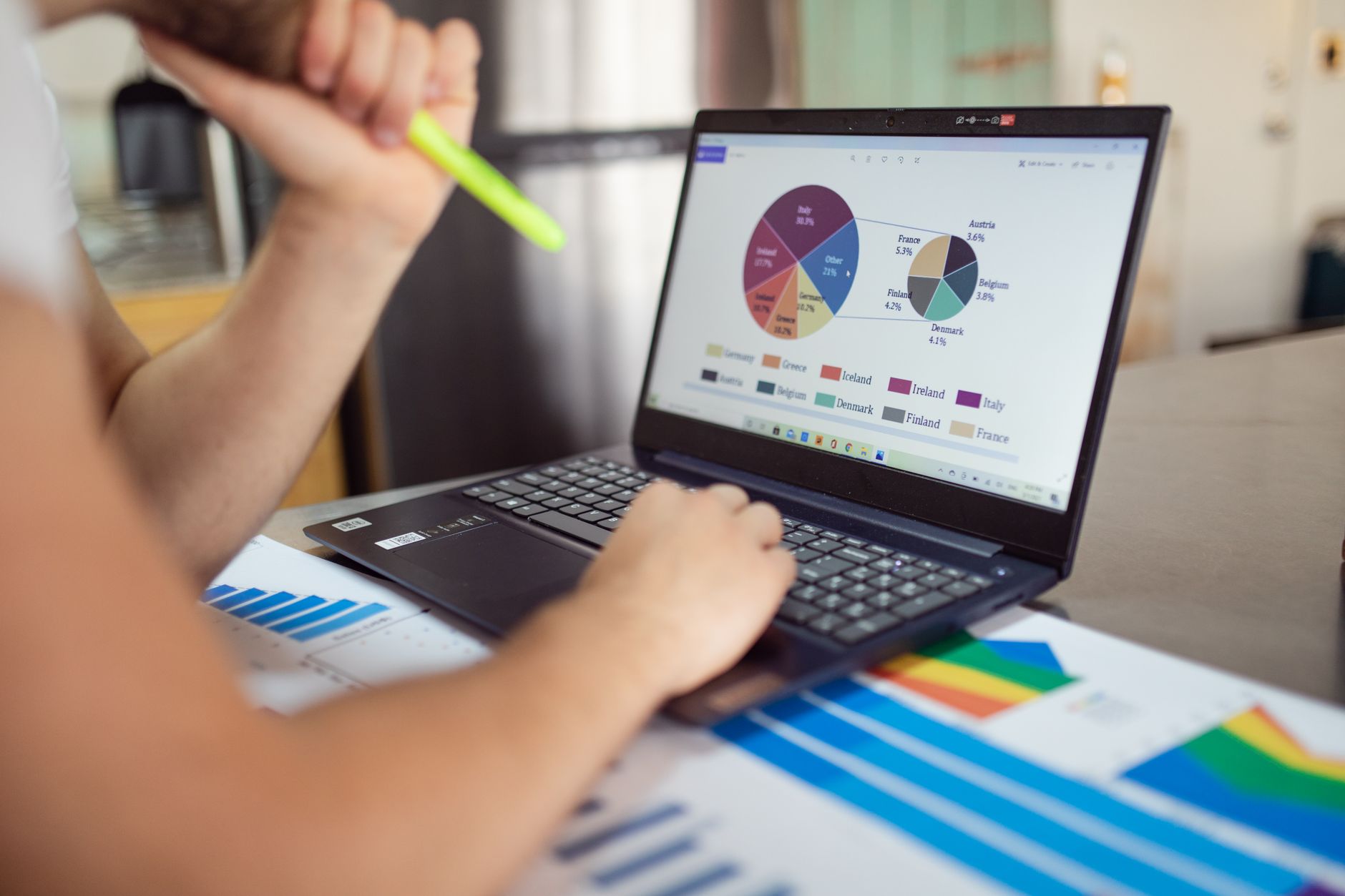 An agency owner managing client content and reporting from a single laptop