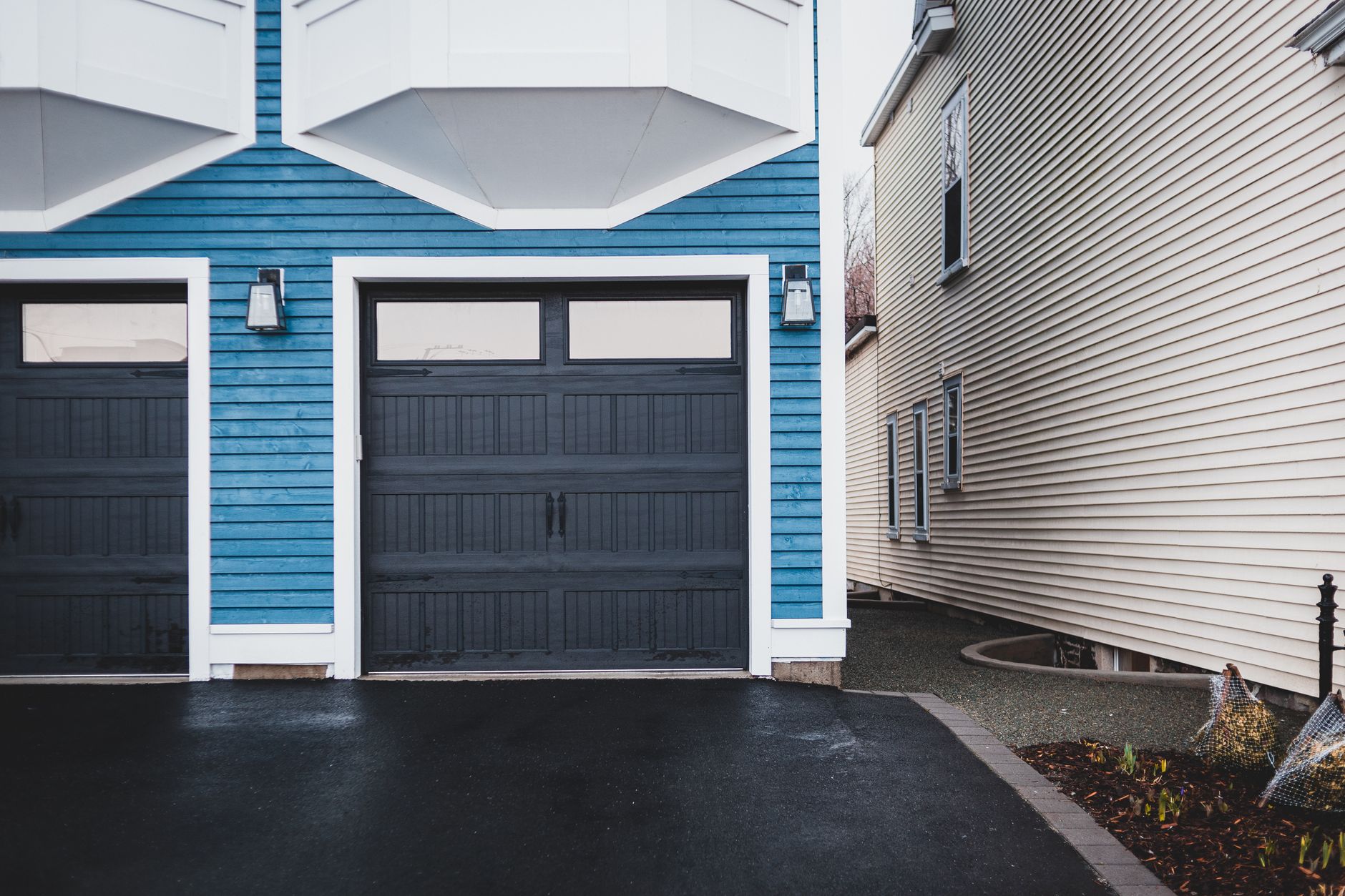 A modern home with a clean, working garage door