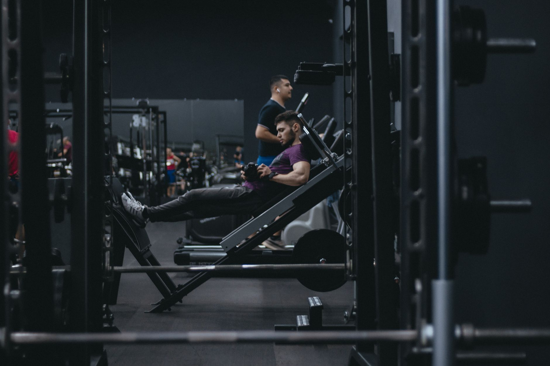 A member training on equipment at the gym