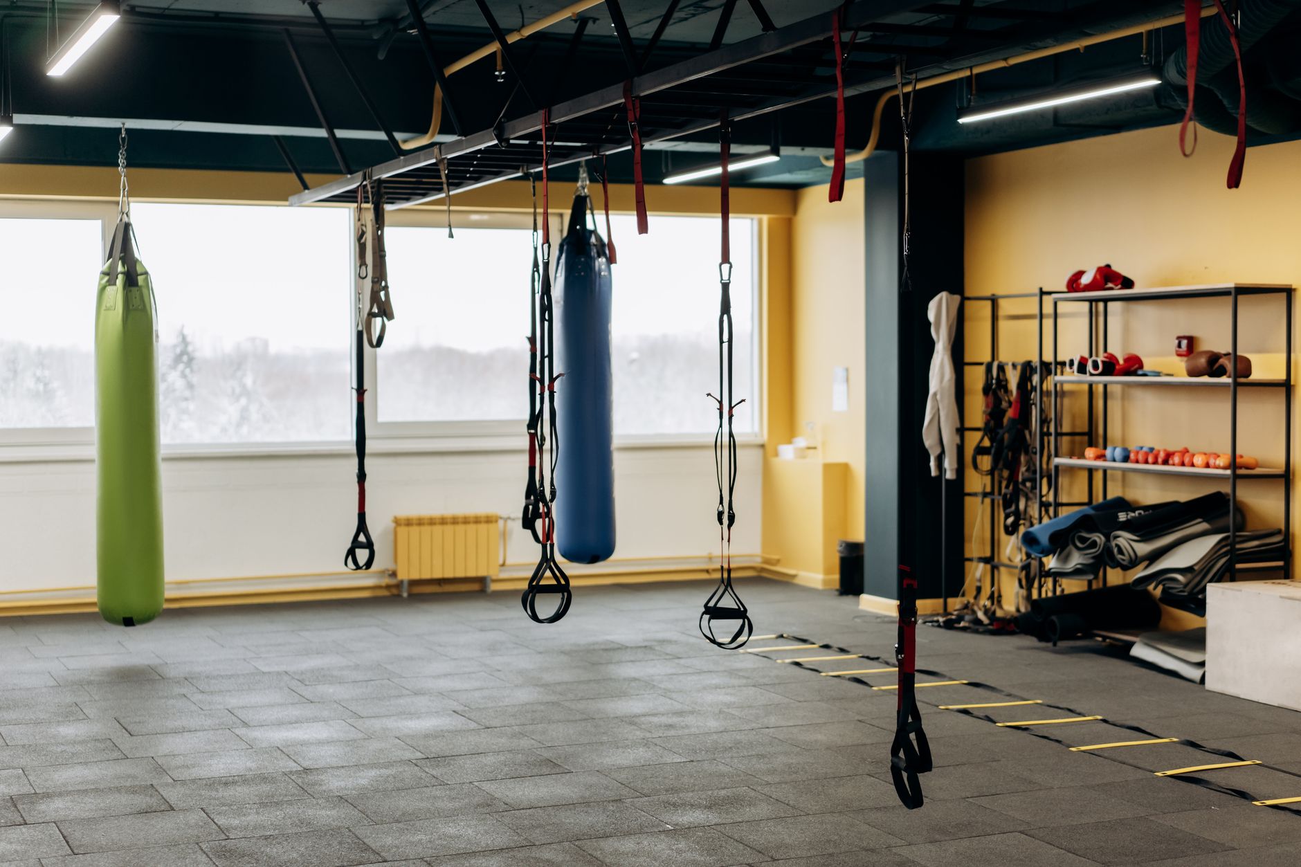 A modern gym floor with open space and equipment