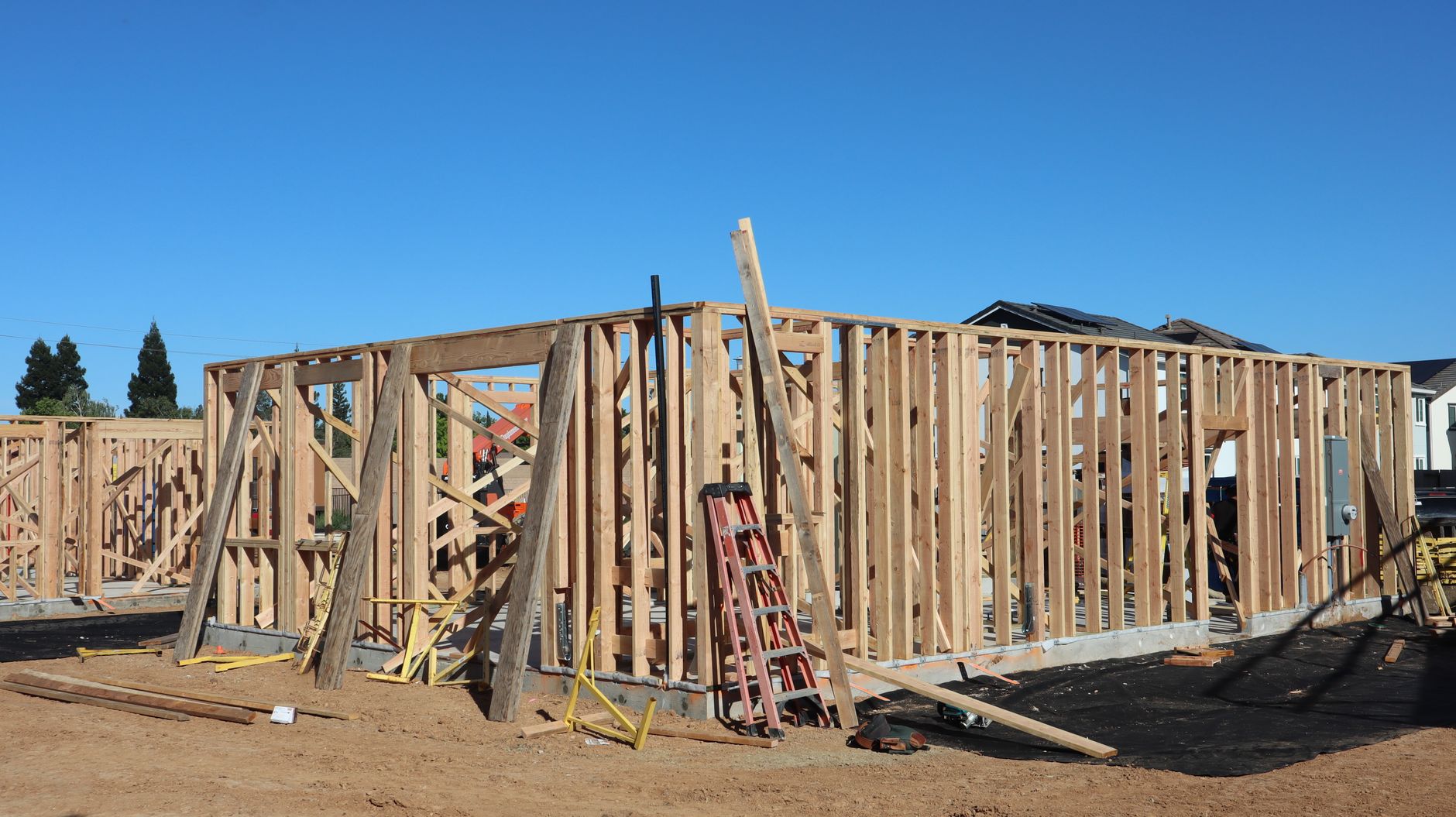 The wood framing of a new home going up on site