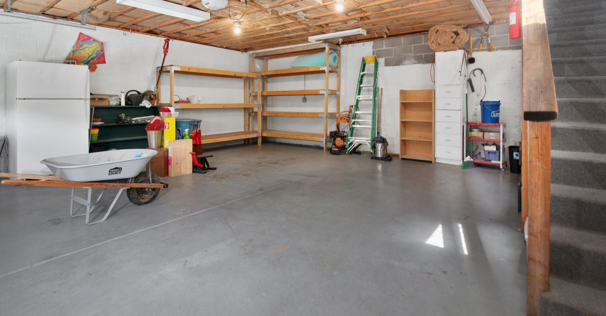 A clean, empty garage after a junk removal crew hauled everything away