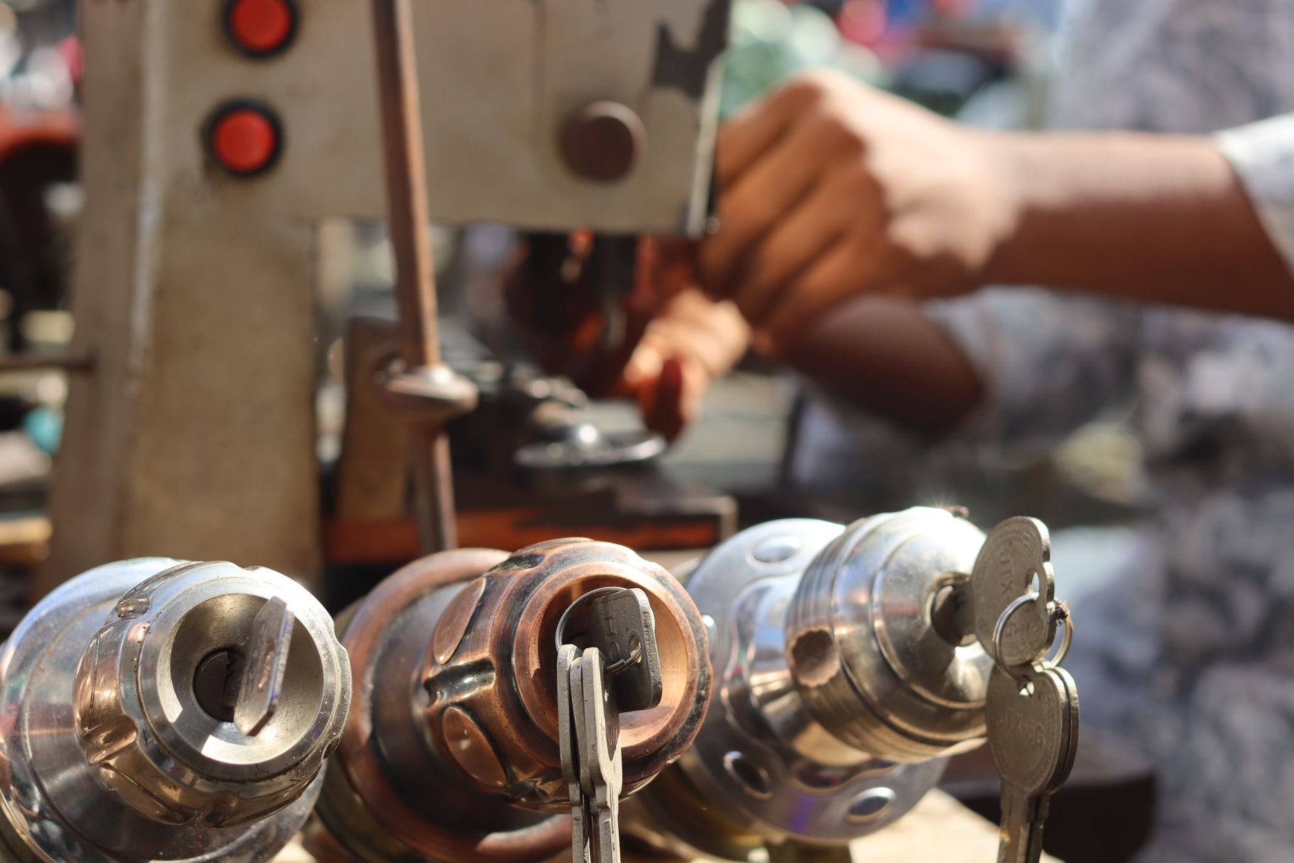 A locksmith working on a lock with professional tools