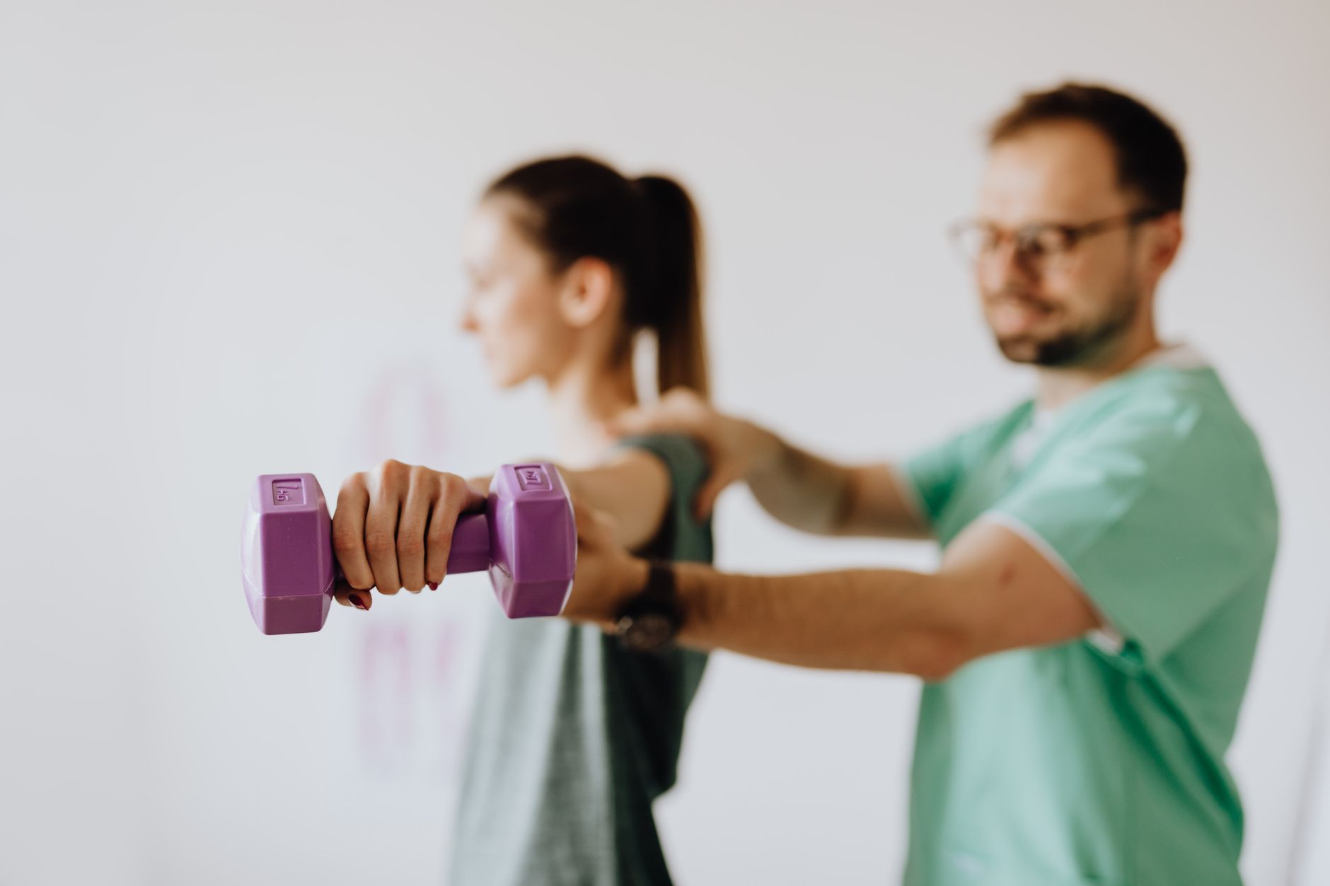 A patient rebuilding strength during a physical therapy session